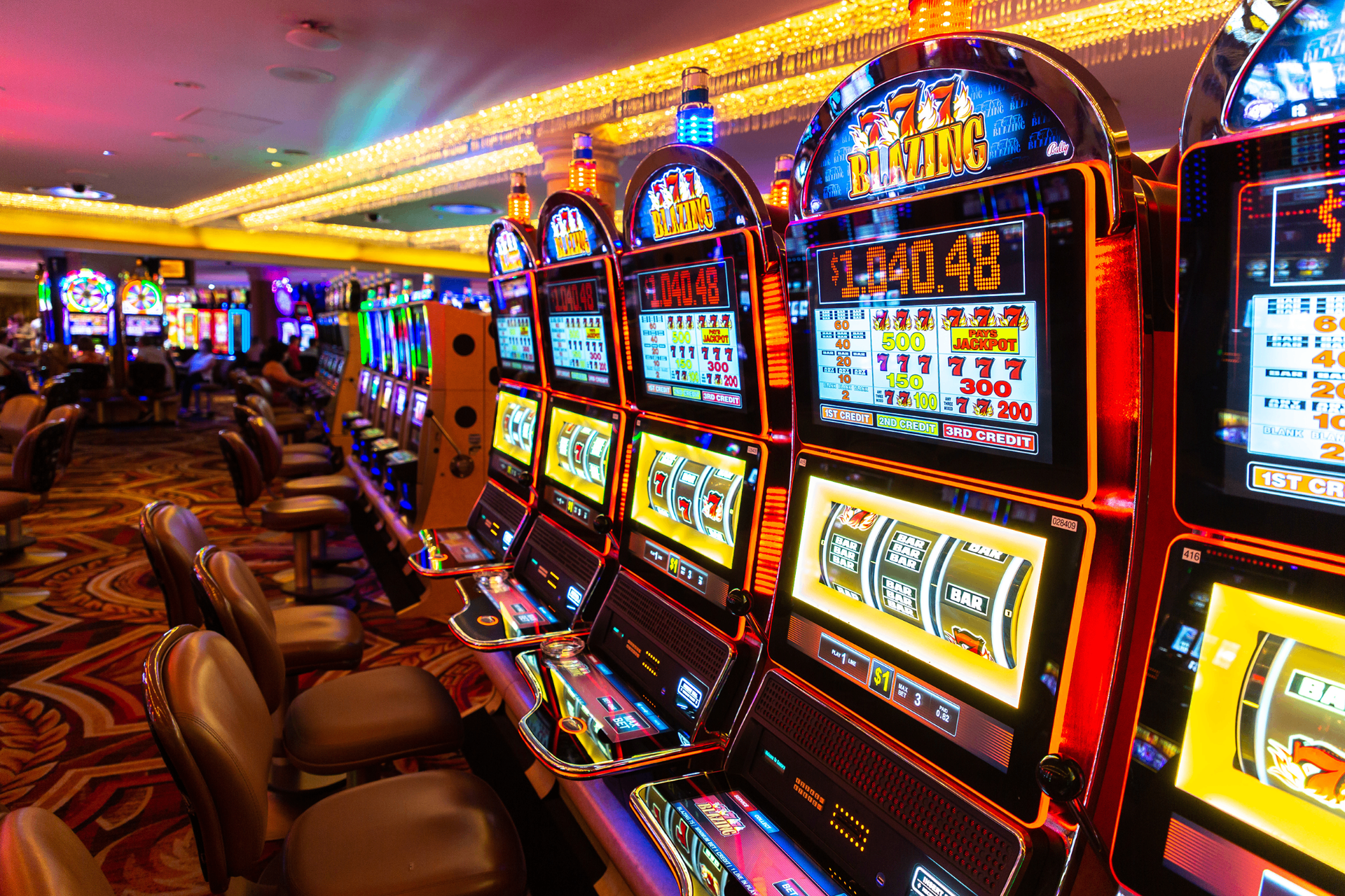 Casino slot machine floor at night